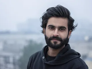 Rohan P. on camera in a WOCOM Meet video conference